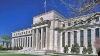 Fed is committed to moving rates down, adviser says